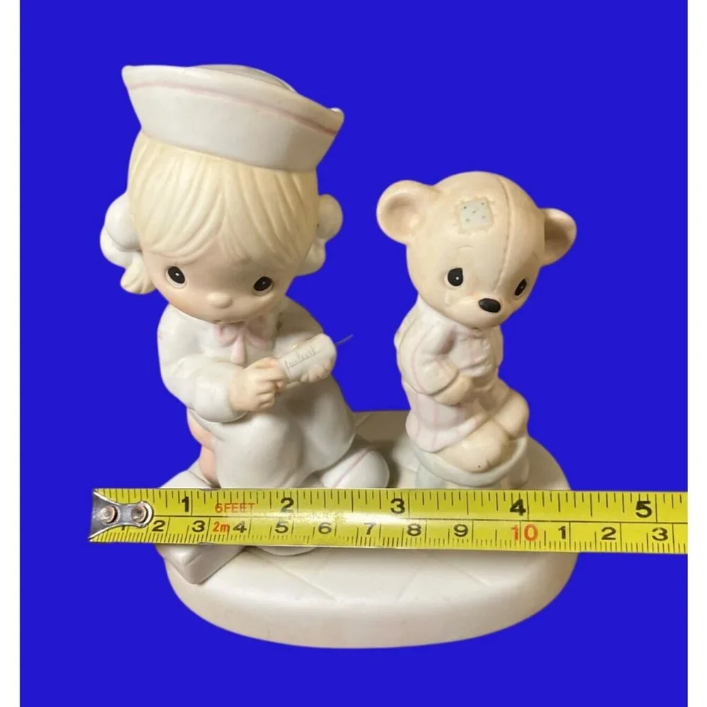 Precious Moments Love Beareth All Things Figurine E-7158 Nurse and Bear